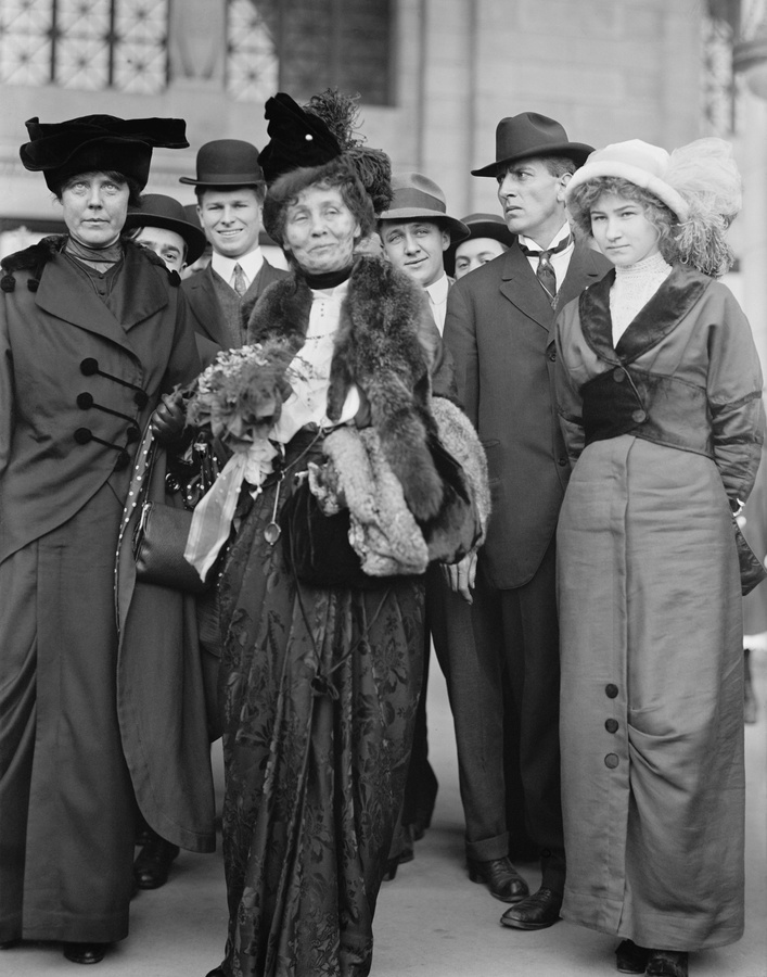 Lucy Burns (left) with Emmeline Pankhurst (center) in Washington, DC, 1913. From 1909-1912, the American Burns worked in the Women's Social and Political Union (WSPU), the activist suffrage organization founded by Pankhurst in 1903  (BSLOC_2018_2_54)
